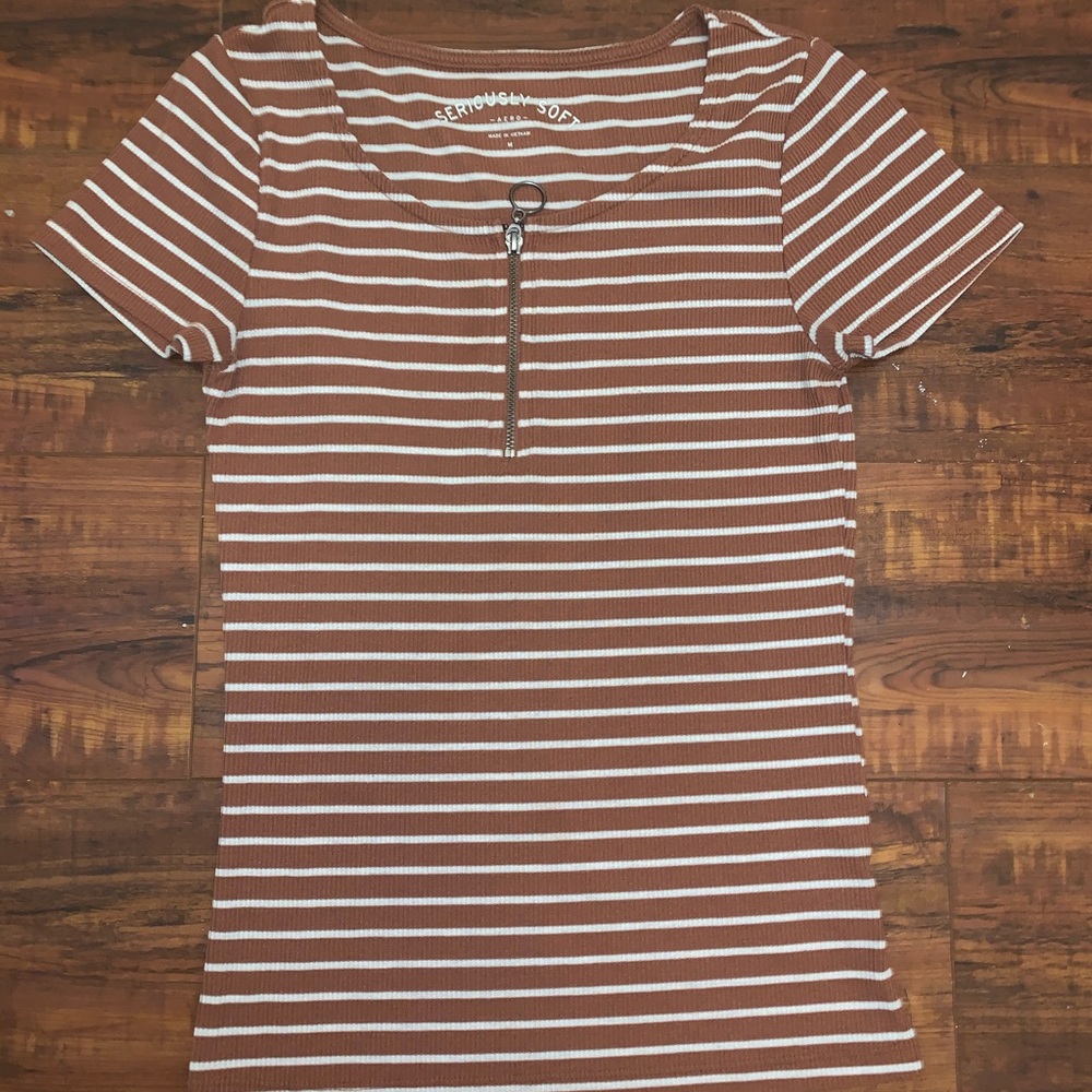 Brown and white zip up striped top